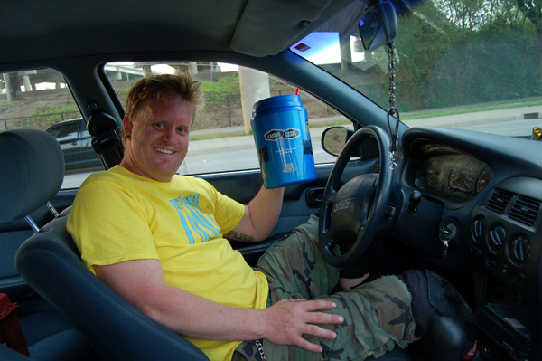 Reggie styles drinking a huge soda pop!