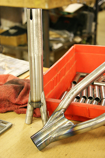 Stove Pipe? Dave has been hemming up this monstrosity for John Lee this week. Yup, that split thing on the left is the seat tube. Google TNT Stove Pipe.