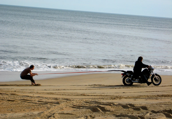 Sand surfing, lords of fun style.