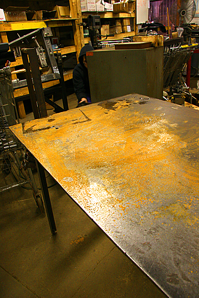 Nothing like a layer of bright orange rust on your welding table.