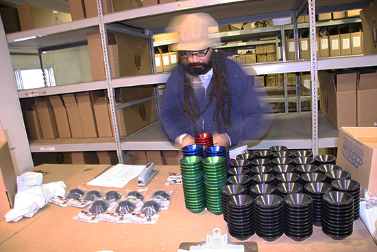 John Lee suited up for the cold, cold task of hubguard packaging.