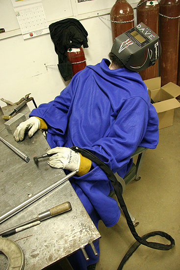 Rainy days make me tired too, but damn. I went out back to shoot Dave welding and he was wrapped up in a Snuggie napping at his work station.