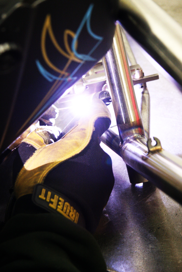 Johnny Corts takes some time from texting and long shits to do some welding.