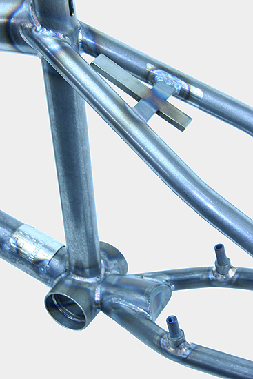 Johnny's pretty convinced this is the most brutal custom frame we've built. Dave's pretty sure it's the ugliest.