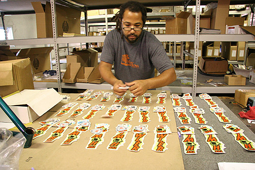 John Lee dealin' stickers.