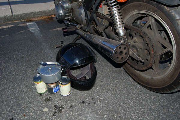 Cooking soup, helmet as a windshield....