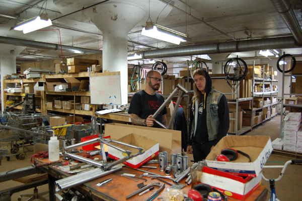 Dave Showing Kenny the inner workings of welded metal