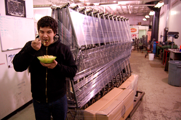 Dylan Cole, sending off batch of frames to heat treat, and eating Hamburger Helper.