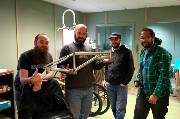 4 stoked dudes with beards and a bike for Chad Herrington