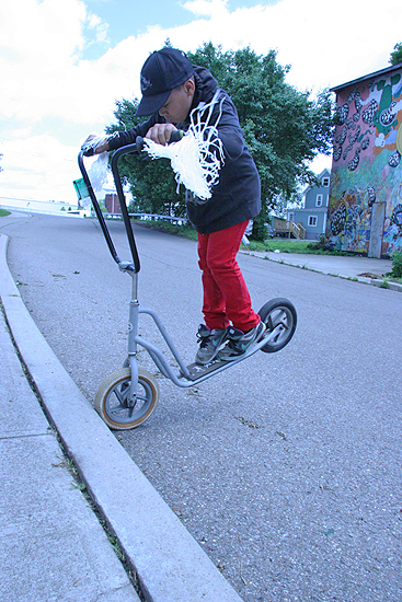 Boogie on the new shop scooter, chopper bars to curb endo.