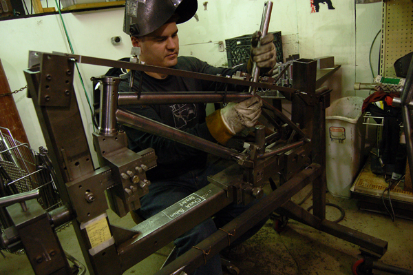 Dave Loading parts into the fixture.
