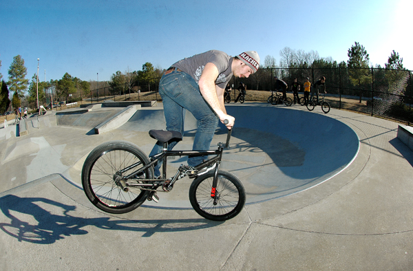 Joel Barnett- Blacken beanie and a mustache.