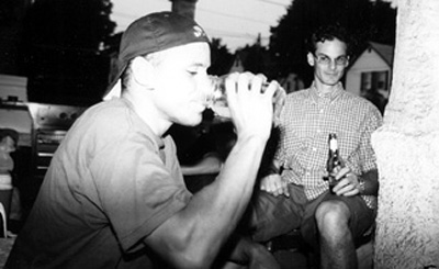 Random photo of Losey and Brad Mcdonald drinking Moonshine on My porch...