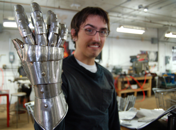 New Welder dude Joby Springsteen. Homemade Robo hand. Chain male is pissed.